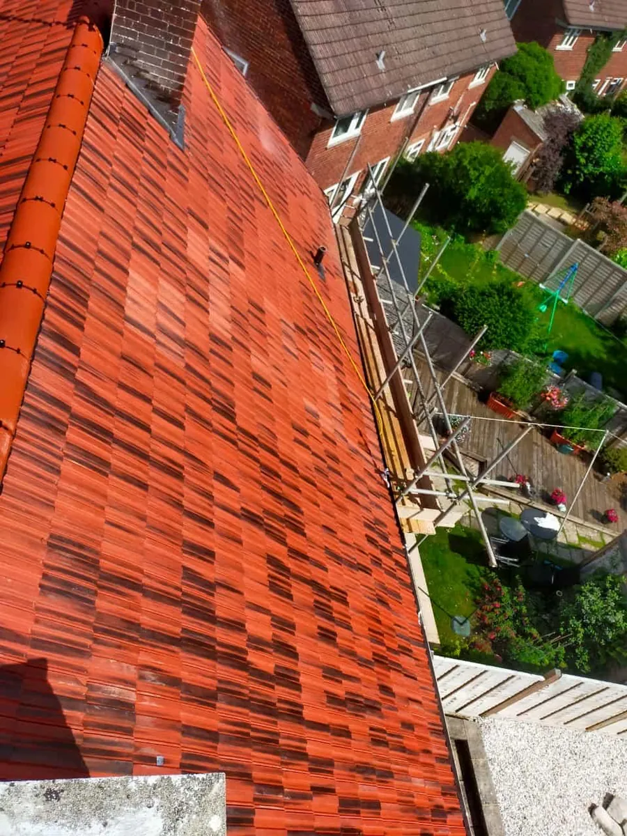 New red tile slope seen from the ridge, Imperial Roofcraft roofing job in London